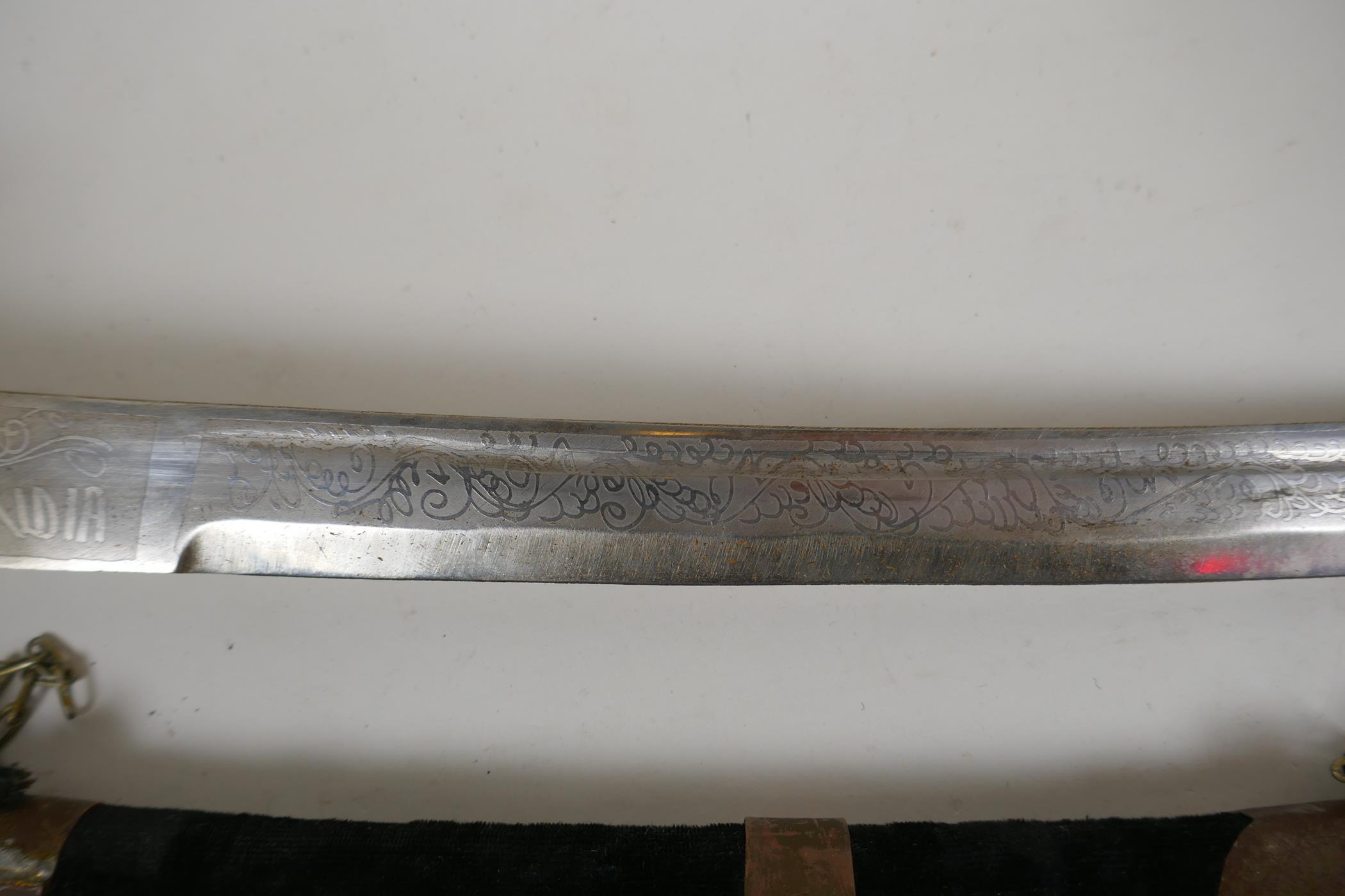 An Indian sabre with brass hilt and copper mounts, together with another smaller, longest blade 75cm - Image 3 of 7