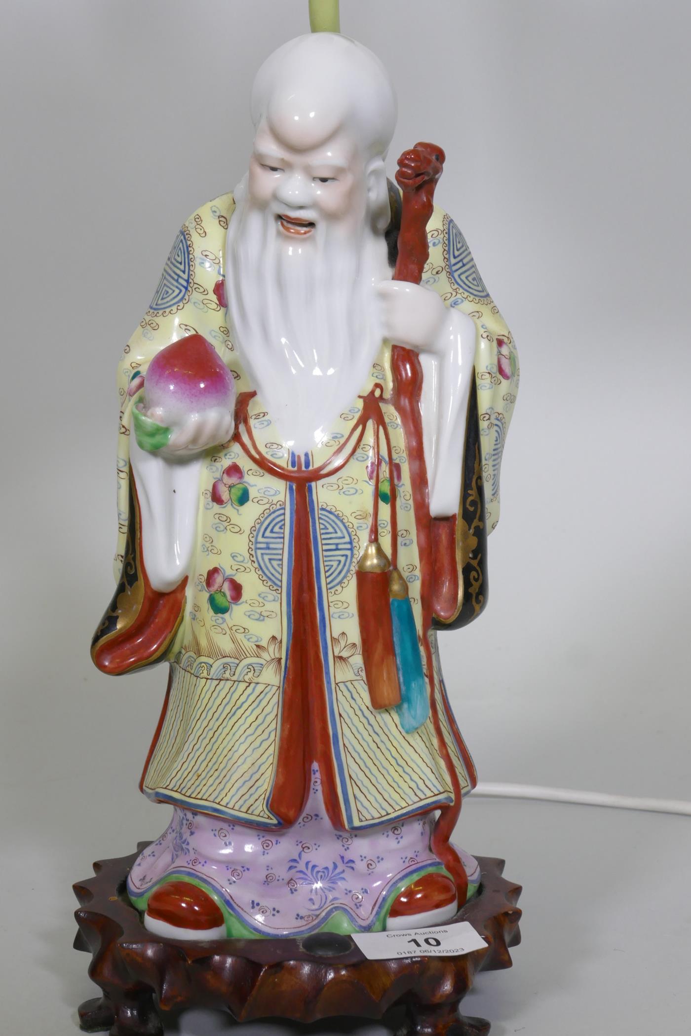 A Chinese porcelain table lamp in the form of Shao Lao holding a peach and staff with dragon's head, - Image 2 of 4