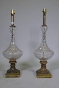 A pair of vintage cut glass table lamps with brass mounts and bases, 76cm high