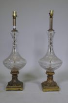 A pair of vintage cut glass table lamps with brass mounts and bases, 76cm high