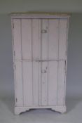 A French painted pine store cabinet, 66 x 30cm, 122cm high