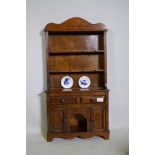 A mid century miniature model of an oak dresser, 40 x 12 x 76cm