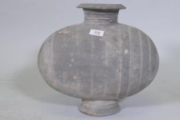 A Chinese ceramic vessel with inscribed decoration, 37cm wide, 34cm high