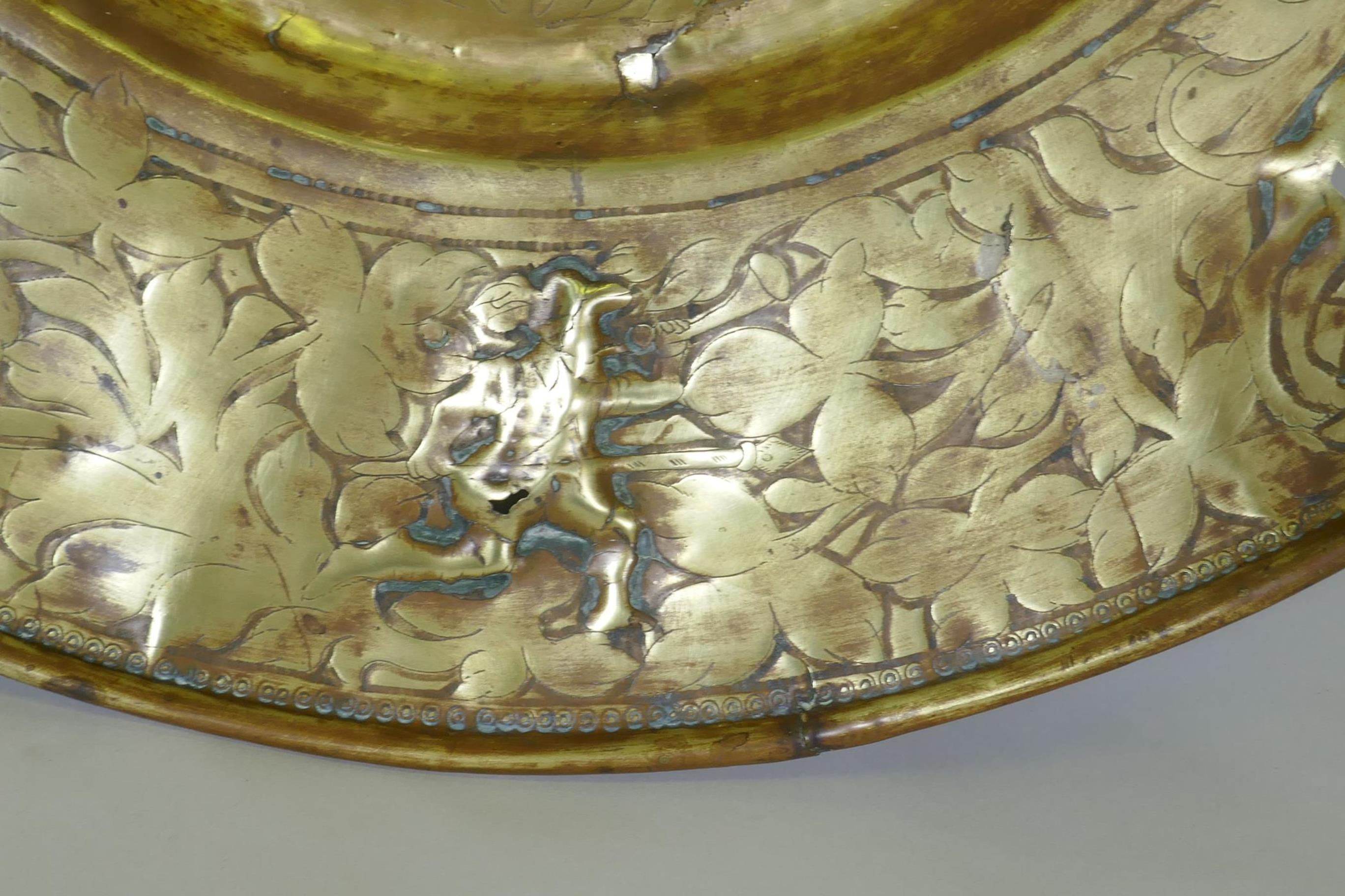 A Nuremburg brass alms dish, the central field with a depiction of Adam and Eve with the Tree of - Image 3 of 3