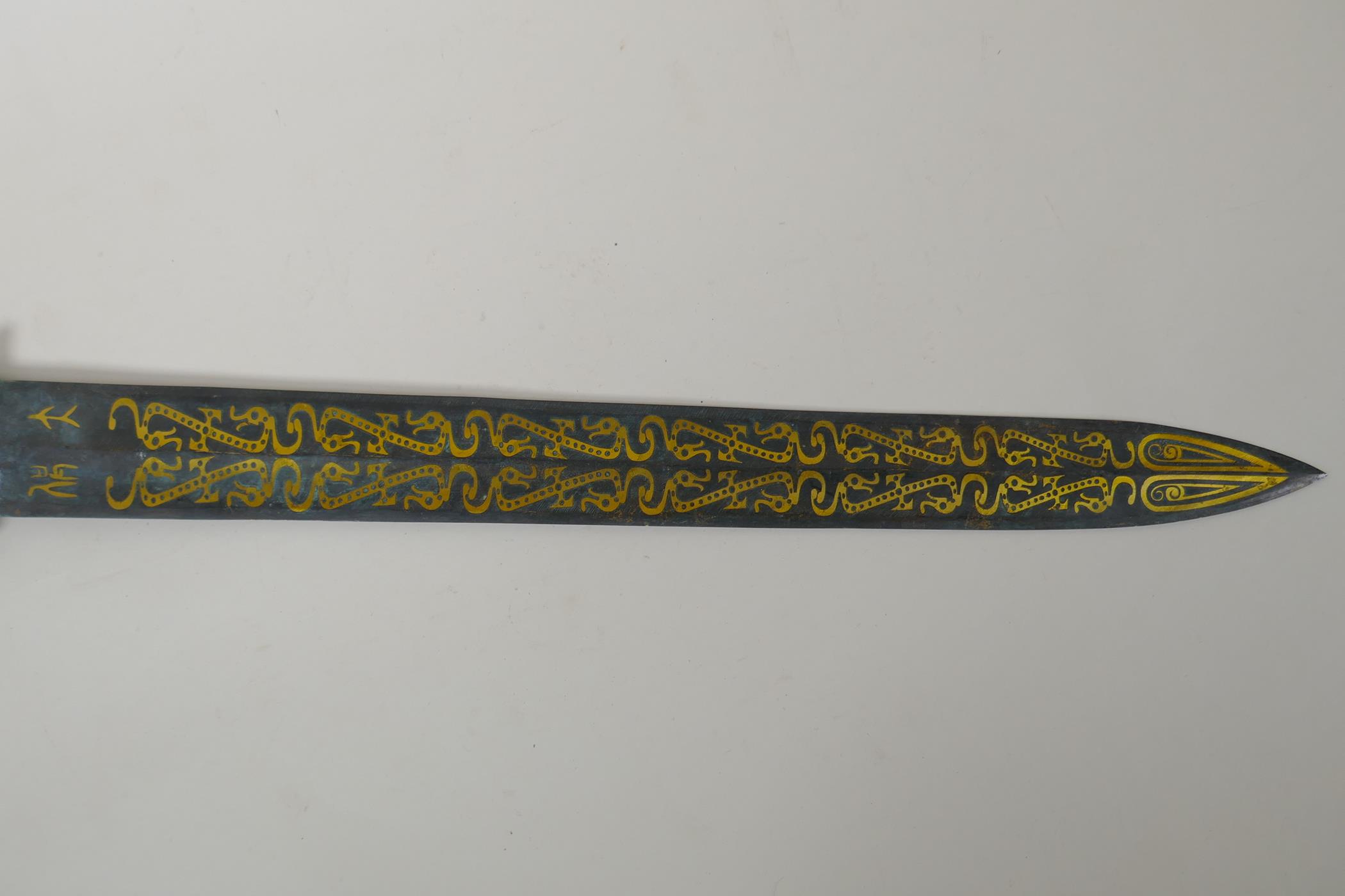 An archaic style Chinese bronze short sword with stylised dragon decoration, 63cm long - Image 2 of 3