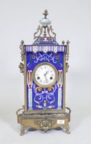 A French style brass case mantel clock with inset cloisonne enamel decoration and enamel dial with