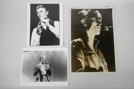 Two 1970s black and white press photographs of David Bowie, with London Features International