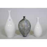 Anne James, studio pottery vase, signed, 20cm high, and two white glazed bottle vases