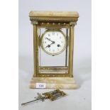 A C19th French gilt brass and alabaster mantel clock, the spring driven movement stamped FOT Bte,