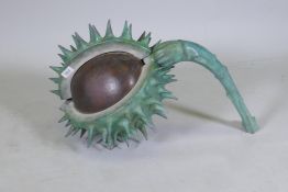 In the manner of Mark Hall, a patinated bronze sculpture of a conker, marked WT 1/9, 65cm long, 52cm