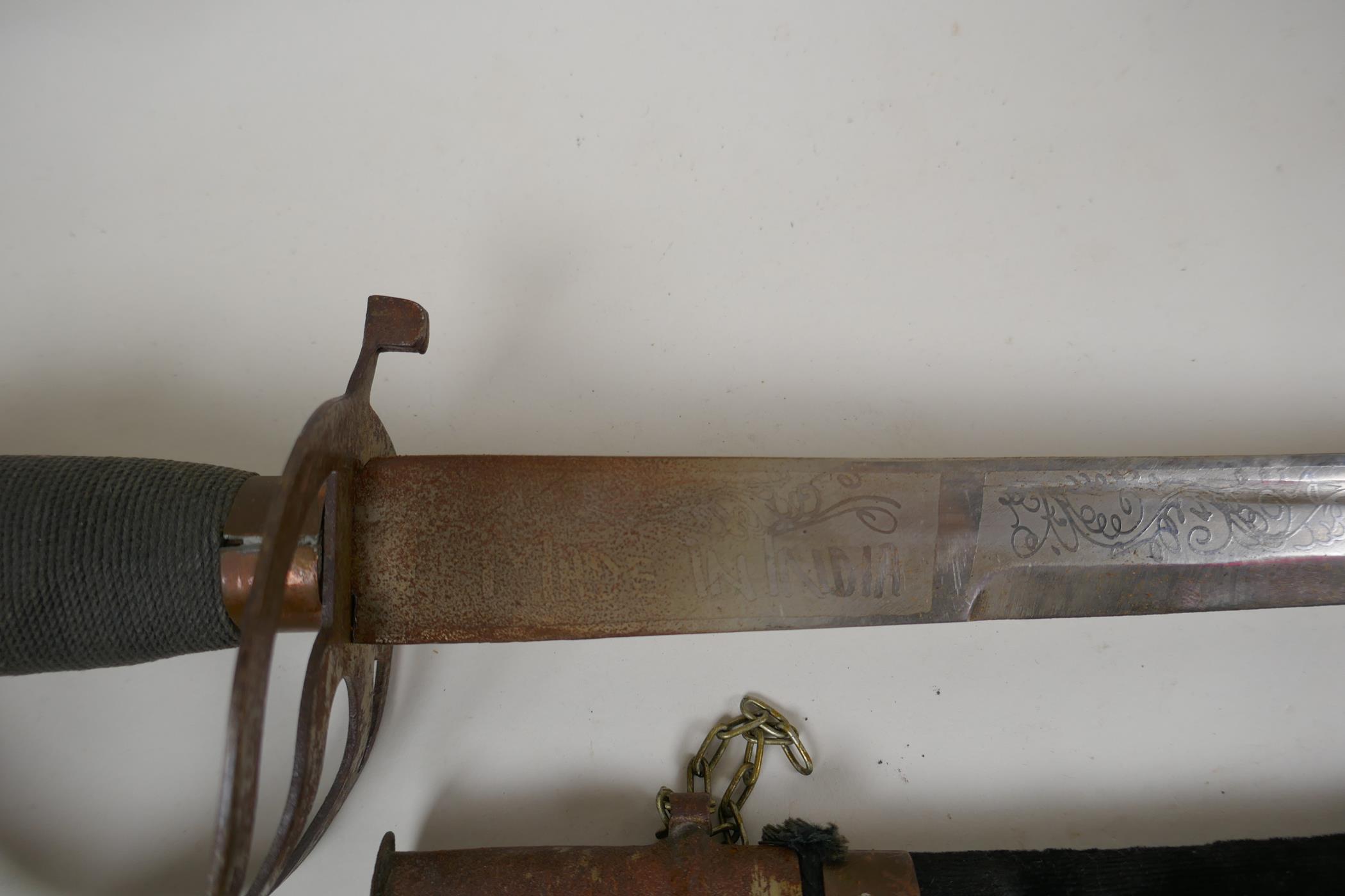 An Indian sabre with brass hilt and copper mounts, together with another smaller, longest blade 75cm - Image 2 of 7
