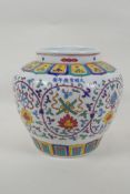 A Chinese polychrome porcelain jar with enamel decoration of flowers and the eight Buddhist