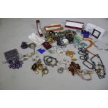 A quantity of costume jewellery, silver rings, jade pendant necklace, uncut amethysts gem stones,