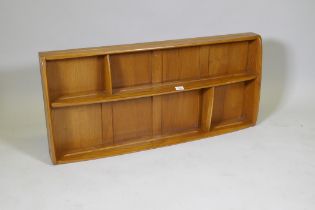 An Ercol elm Windsor plate rack, model 386, 107 x 13cm, 50cm high