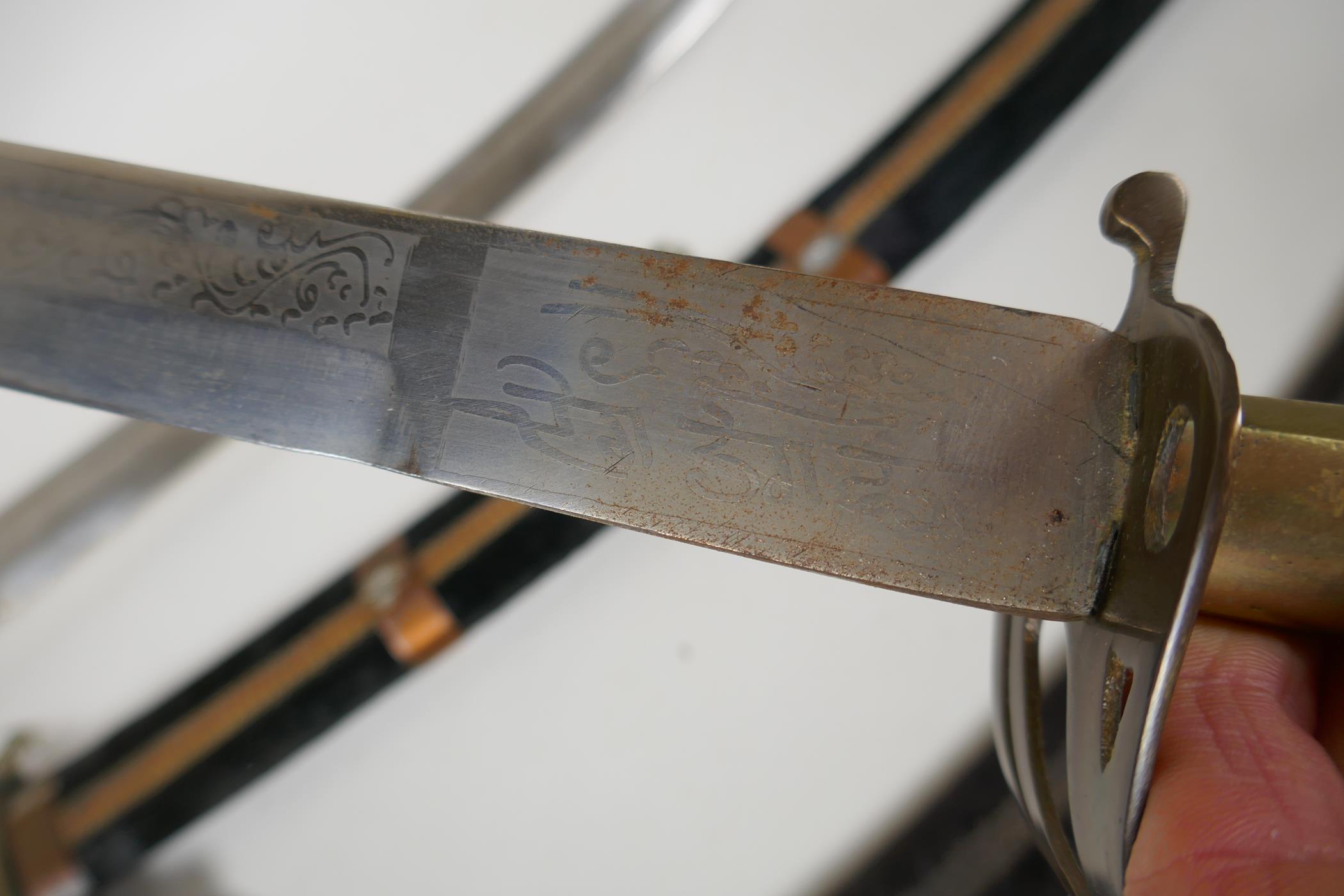 An Indian sabre with brass hilt and copper mounts, together with another smaller, longest blade 75cm - Image 7 of 7