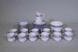 A Royal Worcester twelve place porcelain tea set with blue transfer and gilt decoration, pattern no.