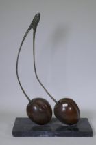 A bronze sculpture of cherries, mounted on a marble base, bronze marked G. de Roux, E.A. 1/IV,