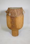 An African Ashanti tribe Atumpan talking drum, 87cm high, 46cm diameter