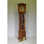 An early mahogany case longcase clock with glazed door and brass and silvered dial, the movement