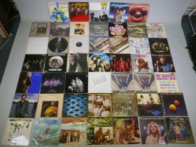 A quantity of 1960s and '70s vinyl LPs including The Beatles 'Rock N Roll Music', 'The White Album',