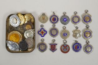 A quantity of vintage sporting medals, mostly silver, 145g
