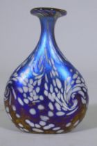 Norman Stuart Clarke, iridescent studio glass vase with swirled decoration, signed to base, 12cm