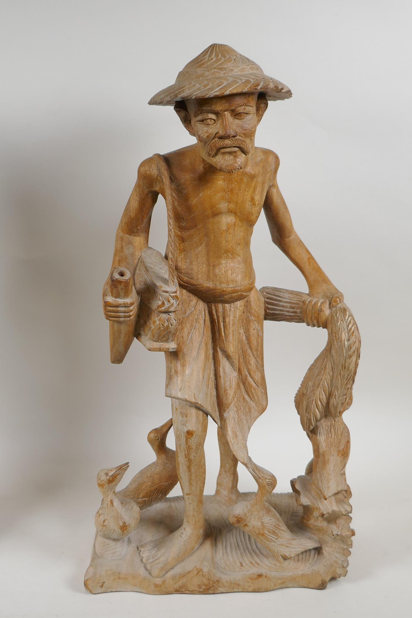 A Balinese carved hardwood figure of a dancer, and an oriental carved wood figure of a duck - Image 3 of 3