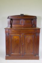 A C19th Regency style Colonial figured hardwood chiffonier, the upper shelf with scroll supports,