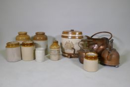 A quantity of antique stoneware jars, a flask and two gallon keg with royal warrant, a coal bucket