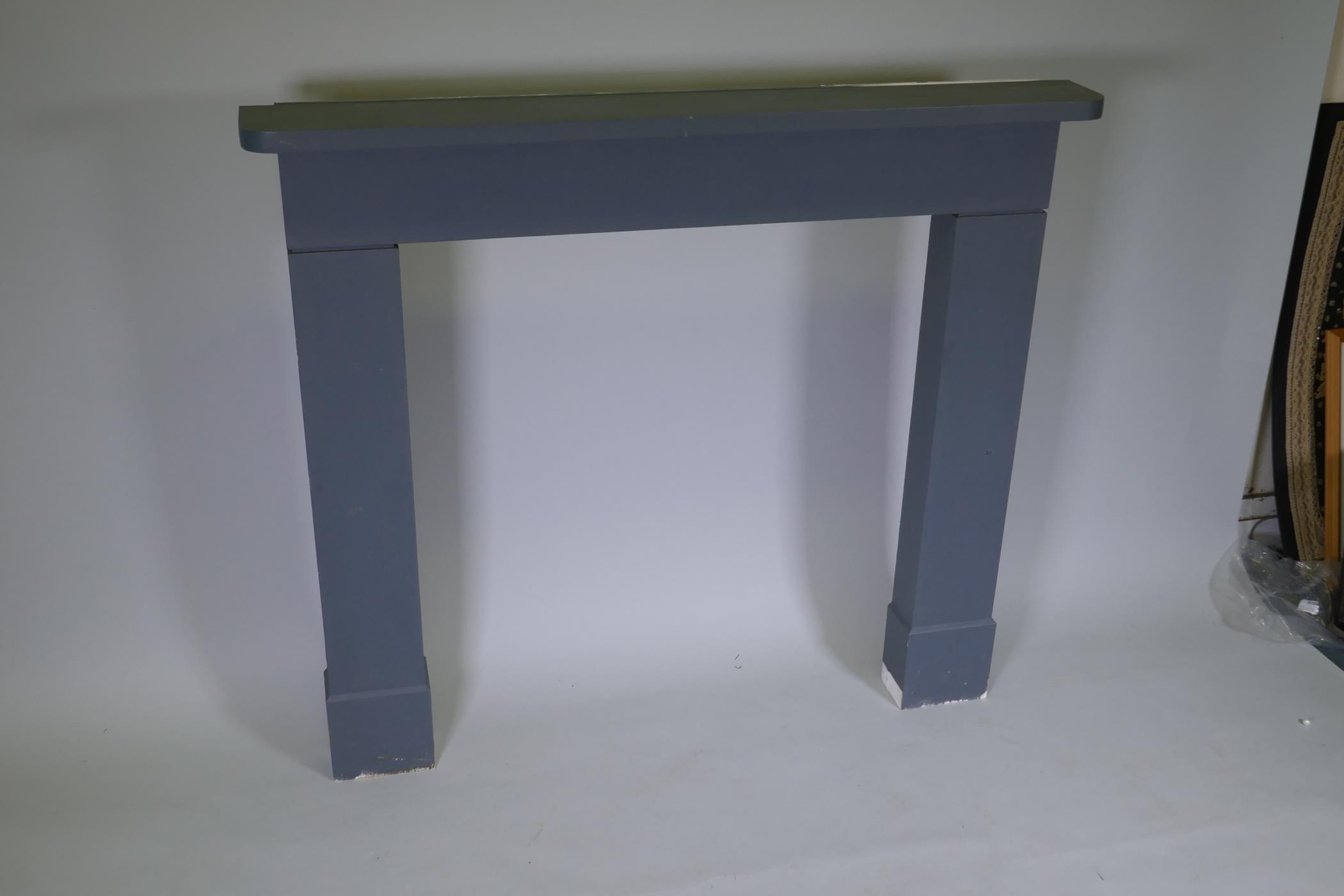 A painted wood fire surround, 131cm wide, 115cm high - Image 2 of 2