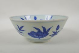 A blue and white porcelain bowl with scrolling floral decoration, Chinese Chenghua 6 character