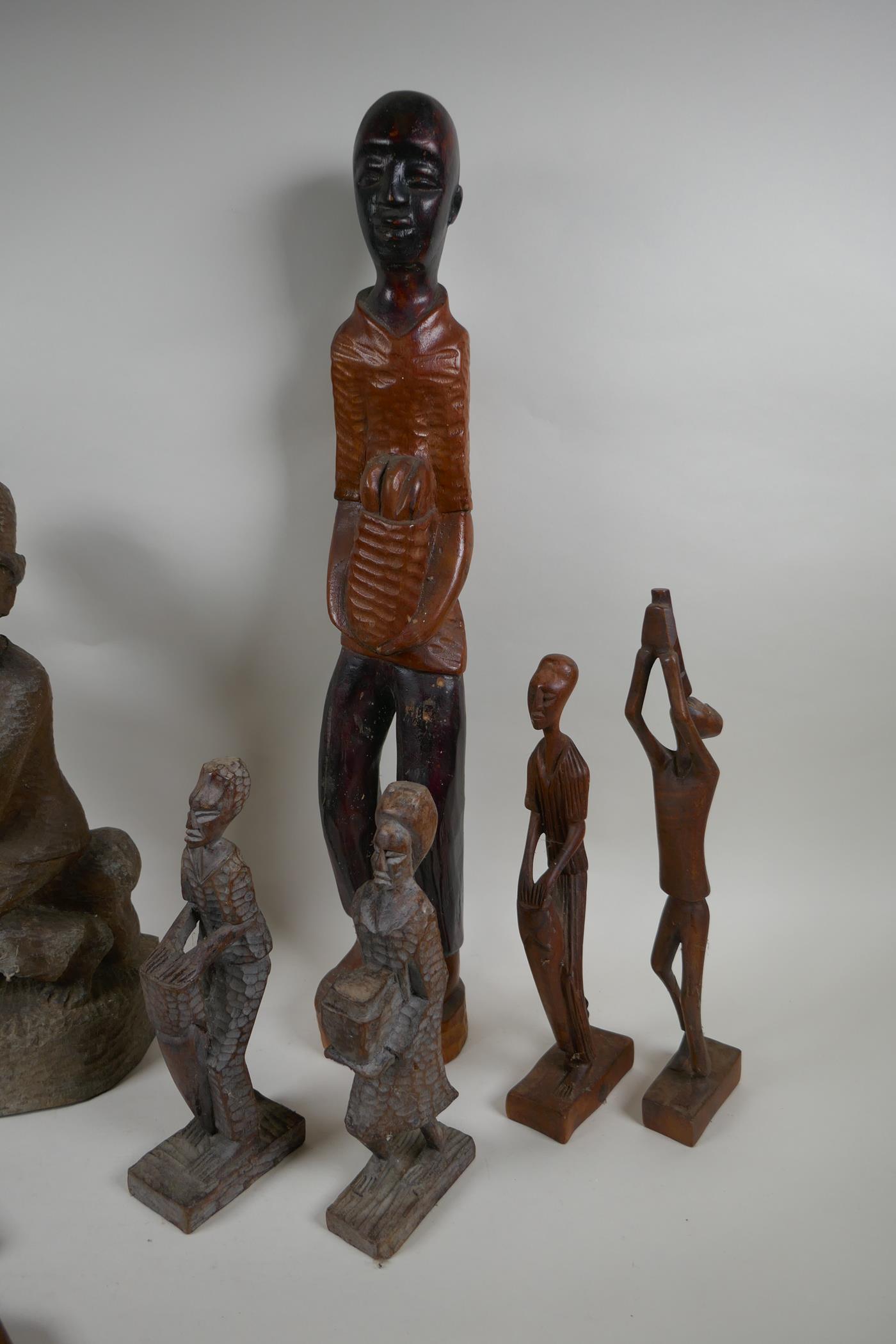 A collection of vintage African carved hardwood figures, largest 56cm high - Image 4 of 7