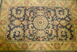 An Indian Aga full pile tea washed wool carpet, 160 x 250cm