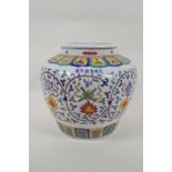 A Chinese polychrome porcelain jar with enamel decoration of flowers and the eight Buddhist