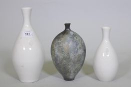 Anne James, studio pottery vase, signed, 20cm high, and two white glazed bottle vases