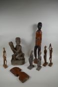 A collection of vintage African carved hardwood figures, largest 56cm high