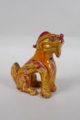 A Chinese amber glazed porcelain fo dog, 13cm high