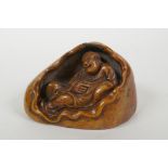 A Chinese soapstone seal with carved Lohan decoration, 10 x 7cm