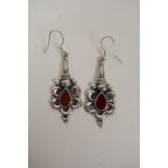 A pair of 925 silver earrings set with red stones, 5cm drop