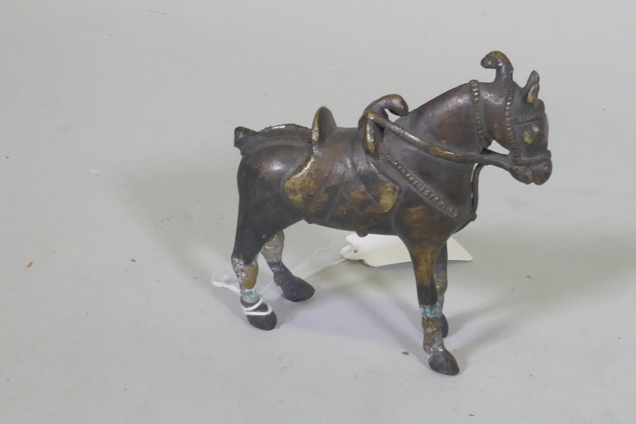 An Eastern bronze figure of a horse with saddle, 10cm high - Image 2 of 3