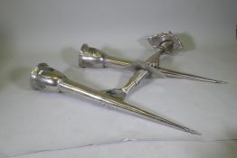 A pair of large white metal wall sconces in the form of a hand bearing a torch, 126 x 43cm