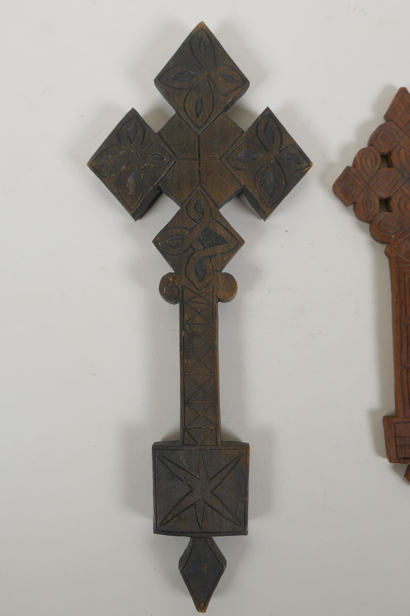 An African carved wood Coptic Cross and another smaller, 31cm - Image 2 of 3