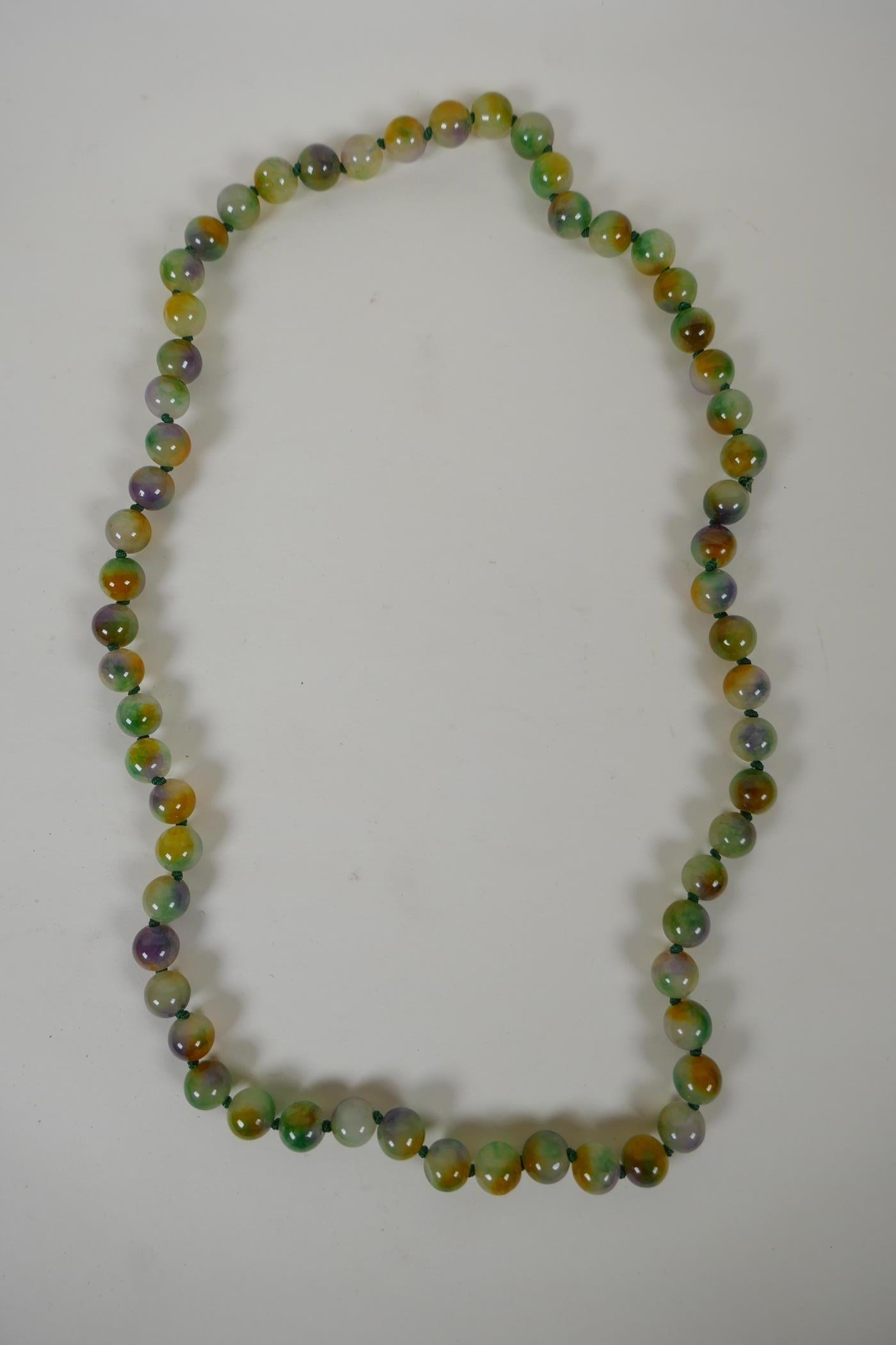 A multi colour jade bead necklace, 78cm long