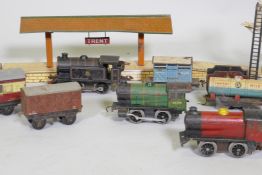 A vintage Hornby, Meccano Ltd O Gauge clockwork railway set, with two type 30 and one type 40