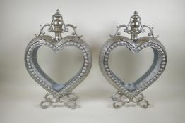 A pair of silvered metal heart shaped lanterns, 51cm high