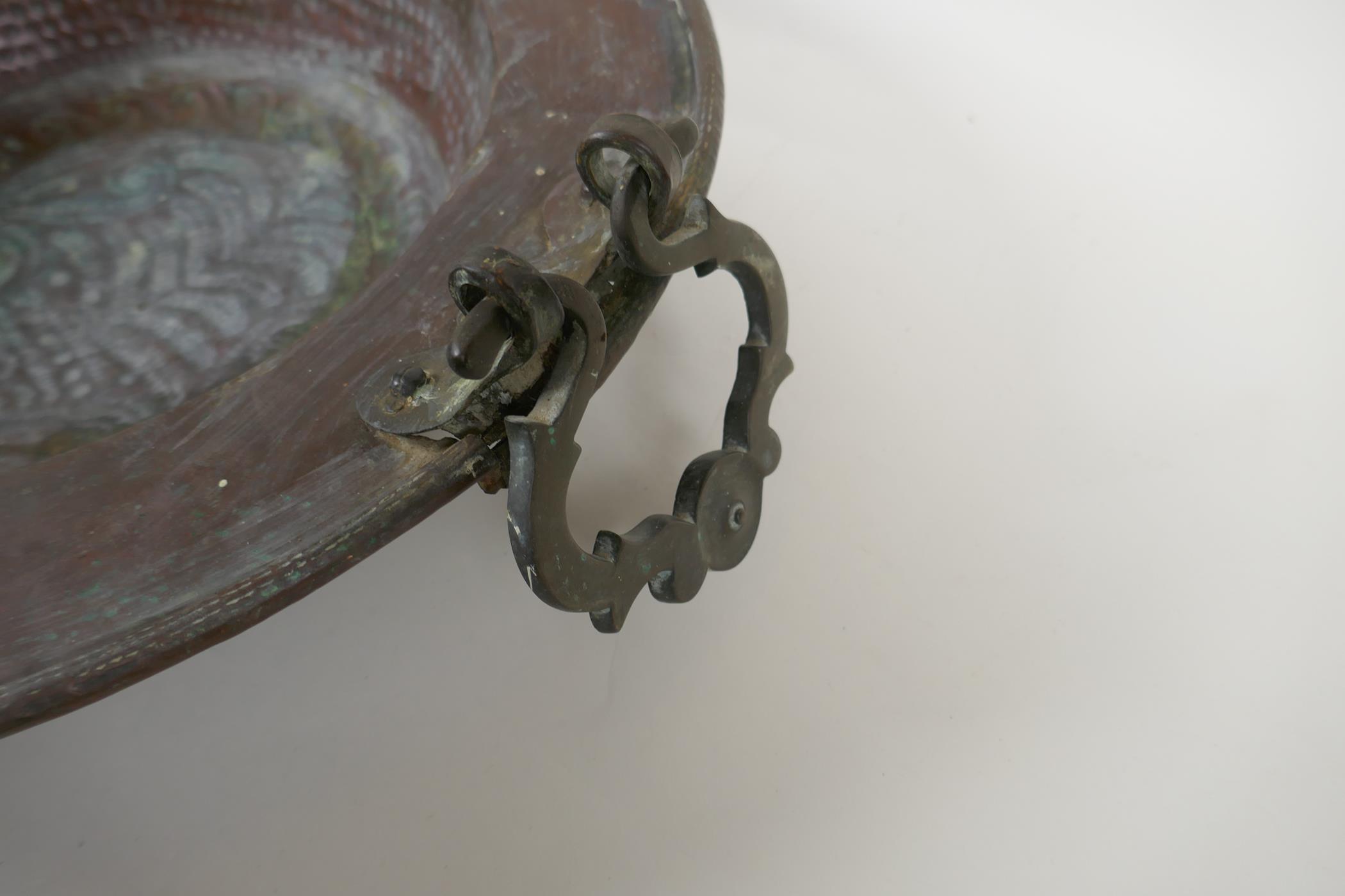 An antique oriental bronze handled copper brazier with hammered decoration, 42cm diameter - Image 4 of 4