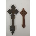 An African carved wood Coptic Cross and another smaller, 31cm