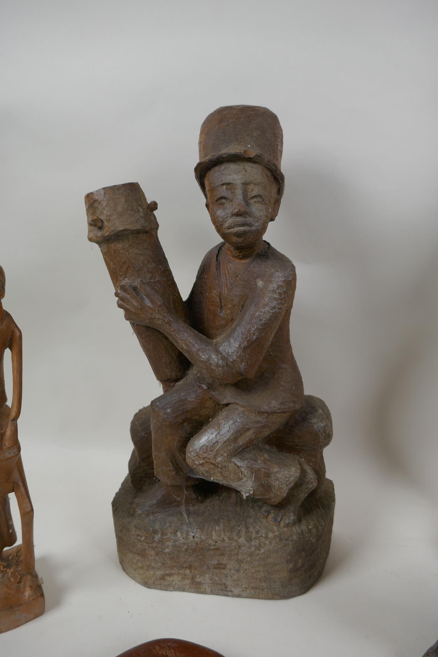 A collection of vintage African carved hardwood figures, largest 56cm high - Image 2 of 7