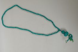 An oriental turquoise style bead necklace with double gourd feature bead, 84cm long