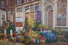 Street scene with flower shop, signed Parker, late C20th, oil on canvas, 102 x 76cm